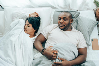 couple sleeping in bed what to expect when you use THC for sleep